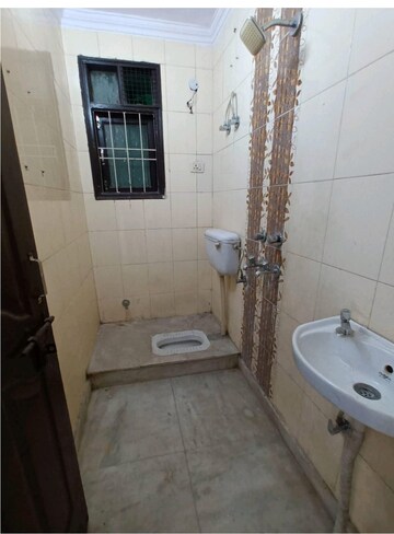 Bathroom in 2 BHK Builder Floor at Mahavir Enclave 1 – for Rent
