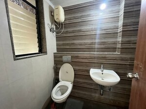 Bathroom in 2 BHK Apartment at Lodha Downtown, Dombivli East – for Rent