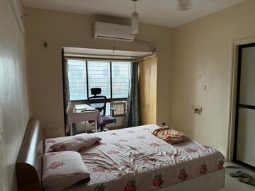 Bedroom in 2 BHK Apartment at Maharaja Retreat CHS, Goregaon East – for Rent