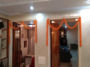 Living Room in 4 BHK Apartment at Beleghata – for Sale