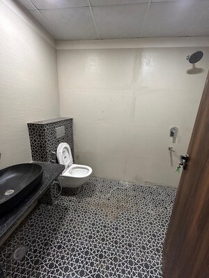 Bathroom in 4 BHK Apartment at Tilak Nagar – for Sale
