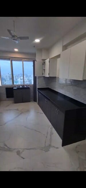 Kitchen in 4 BHK Apartment at Joy Legend, Khar West – for Rent