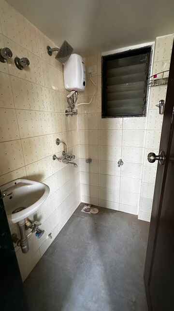 Bathroom in 1 BHK Apartment at JP Decks, Goregaon East – for Rent