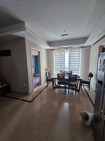 Living Room in 4 BHK Apartment at Mahagun Mezzaria, Sector 78 – for Rent