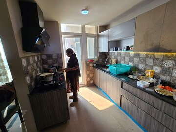 Kitchen in 4 BHK Apartment at Mahagun Mezzaria, Sector 78 – for Rent