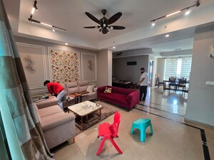 Living Room in 4 BHK Apartment at Mahagun Mezzaria, Sector 78 – for Rent