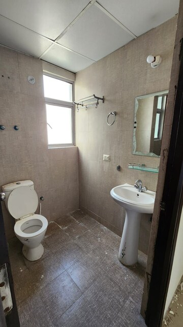 Bathroom in 1 BHK Apartment at Aditya Urban Homes, Shahpur Bamheta – for Rent