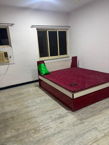 Bedroom in 2 BHK Apartment at Balmoral CHS, Goregaon East – for Rent