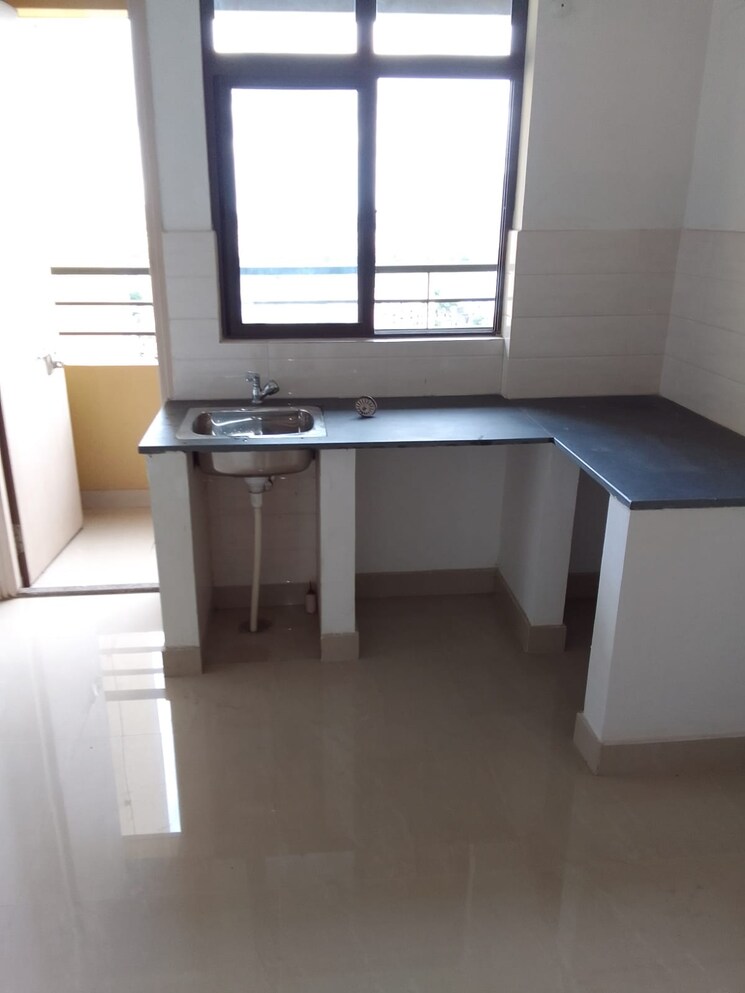 Kitchen, ambuja-utalika-the-condoville 1 Bedroom 513 Sq.Ft. Apartment In Em Bypass Kolkata 9575247