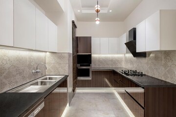 Kitchen in 4 BHK Apartment at Wave City – for Sale