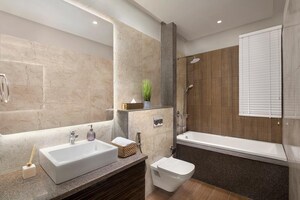 Bathroom in 4 BHK Apartment at Wave City – for Sale