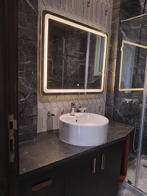 Bathroom in 3.5 BHK Apartment at Defence Colony – for Rent