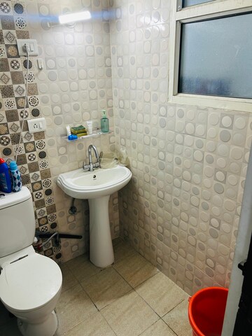 Bathroom in 2 BHK Apartment at Uninav Heights Phase I, Raj Nagar Extension – for Rent