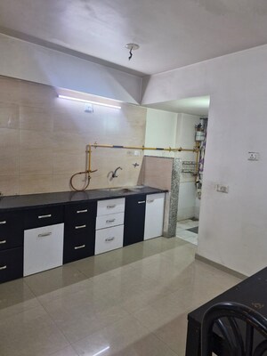 Kitchen in 2 BHK Apartment at Shree Sadan Vasna, Vasna – for Rent