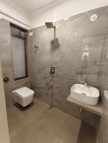 Bathroom in 2 BHK Apartment at Unique The Skyline, Mira Road – for Rent