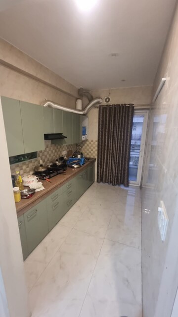 Kitchen in 3 BHK Apartment at ROF Ananda, Sector 95 – for Sale