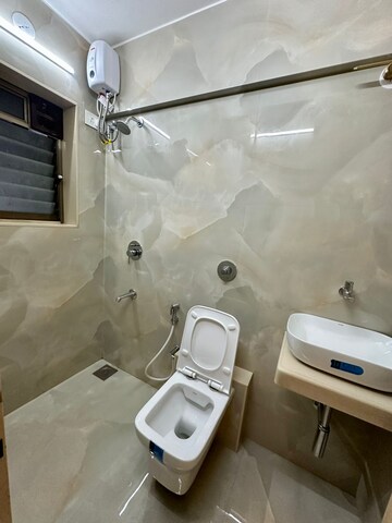 Bathroom in 4 BHK Apartment at Kulshree Heights, Andheri East – for Rent