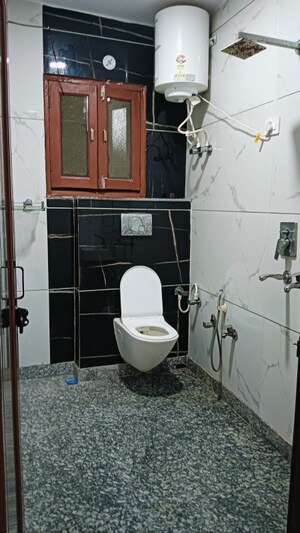 Bathroom in 3 BHK Builder Floor at Dwarka Mor – for Rent