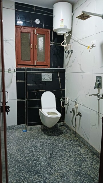 Bathroom in 3 BHK Builder Floor at Dwarka Mor – for Rent