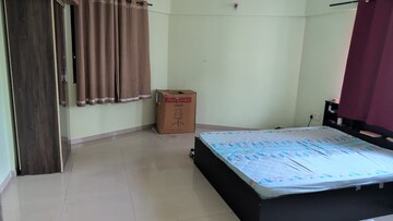 Bedroom in Studio Apartment at Gera Emerald City, Kharadi – for Rent