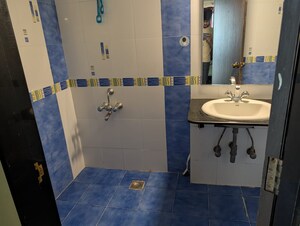 Bathroom in Studio Apartment at Gera Emerald City, Kharadi – for Rent