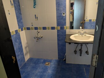 Bathroom in Studio Apartment at Gera Emerald City, Kharadi – for Rent