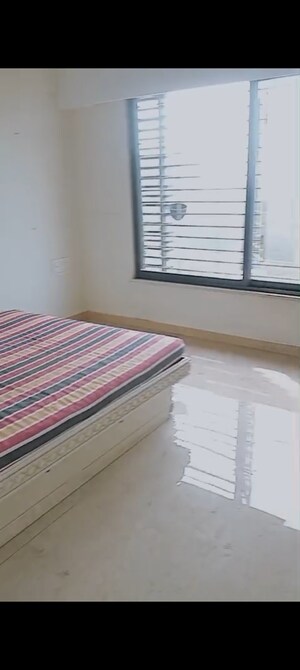Bedroom in 2 BHK Apartment at Shivam Mamta, Andheri West – for Rent