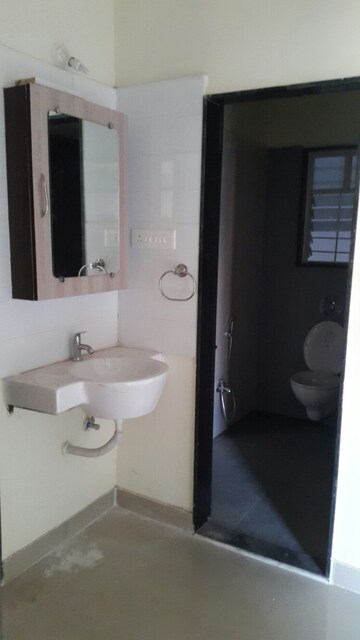 Bathroom in 2 BHK Apartment at Mittal Arcvista, Dhanori – for Rent