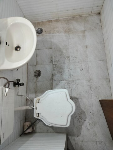 Bathroom in 2 BHK Apartment at RWA Jasola Sector 8 SFS Flat, Jasola – for Sale