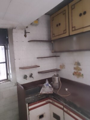 Kitchen in 1 BHK Apartment at Alka Bhuvan CHS, Yogi Nagar – for Rent