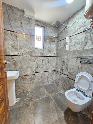 Bathroom in 2 BHK Apartment at Aman Luxury Apartments, Sahastradhara Road – for Rent