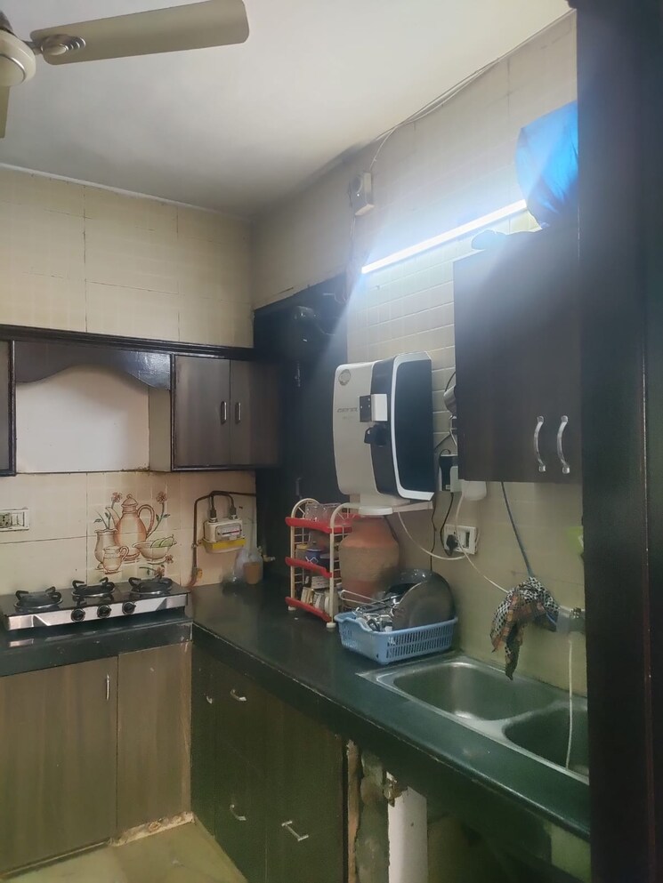 Kitchen, gulmohar park 3 Bedroom 500 Sq.Yd. Builder Floor In Gulmohar Park Delhi 9576650