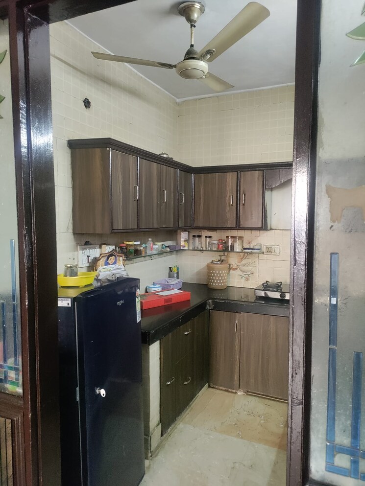 Kitchen, gulmohar park 4 Bedroom 501 Sq.Yd. Builder Floor In Gulmohar Park Delhi 9576673