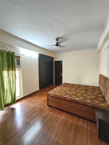 Bedroom in 3.5 BHK Apartment at Aims Golf City, Sector 75 – for Rent