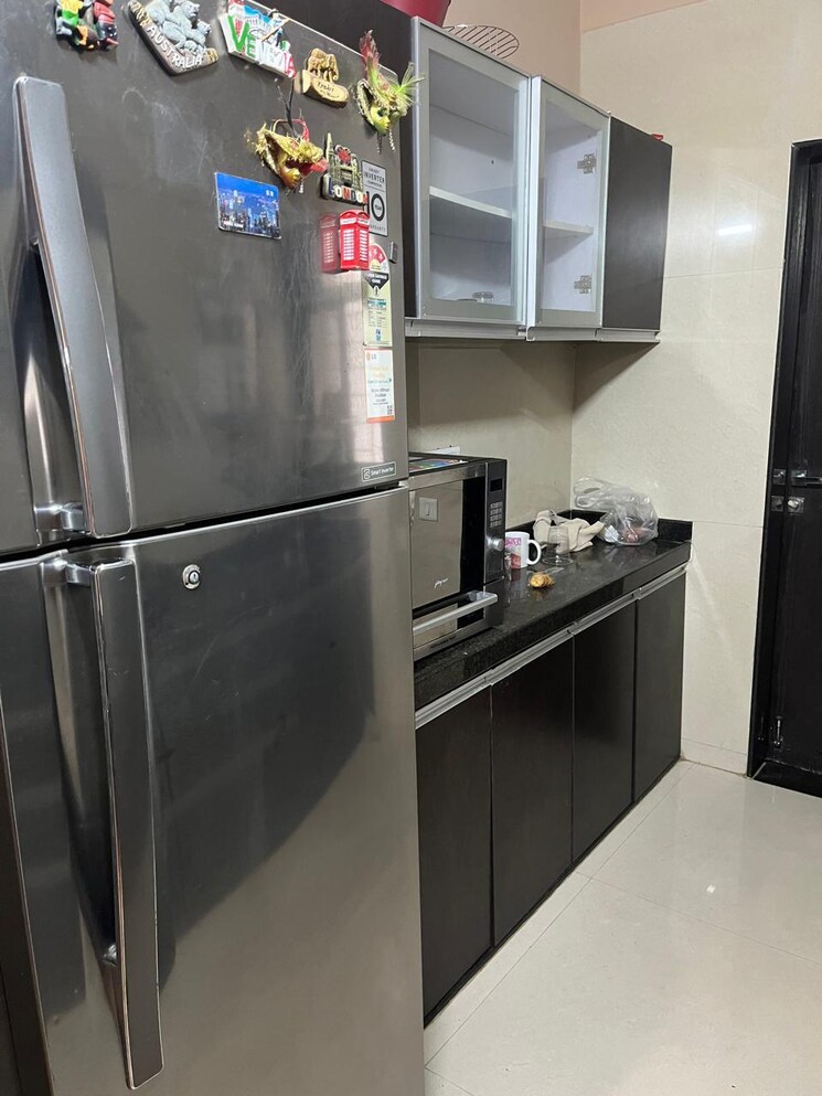 Kitchen, gini-viviana 2 Bedroom 715 Sq.Ft. Apartment In Balewadi Pune 9576734