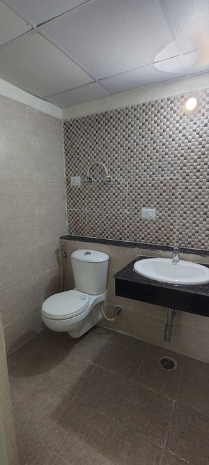 Bathroom in 3 BHK Apartment at Shri Radha Sky Park, Sector 16b Greater Noida – for Rent