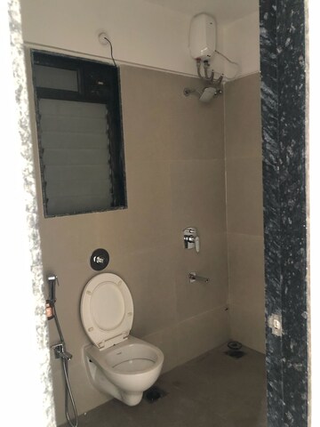 Bathroom in 1 BHK Apartment at Je And Vee Om Trimurti, Malad East – for Rent