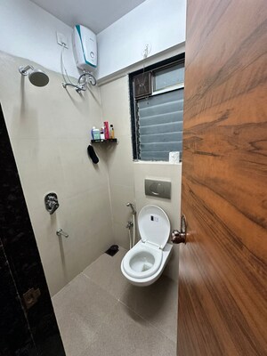 Bathroom in 1 BHK Apartment at Je And Vee Om Trimurti, Malad East – for Rent