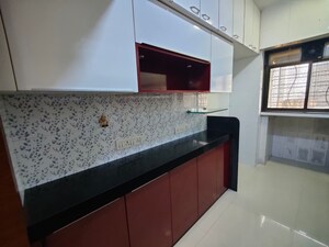 Kitchen in 2 BHK Apartment at Riddhi Tower, Malad East – for Rent