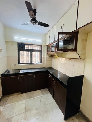 Kitchen in 2 BHK Apartment at Satellite Garden, Goregaon East – for Rent