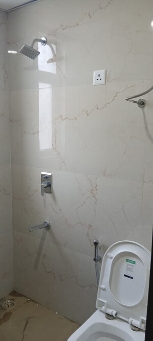 Bathroom in 2.5 BHK Builder Floor at Smart World Gems, Sector 89 – for Rent