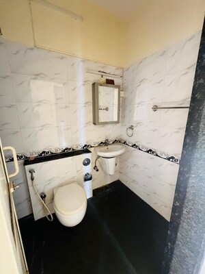 Bathroom in 2 BHK Apartment at K Raheja Raheja Residency, Malad East – for Rent