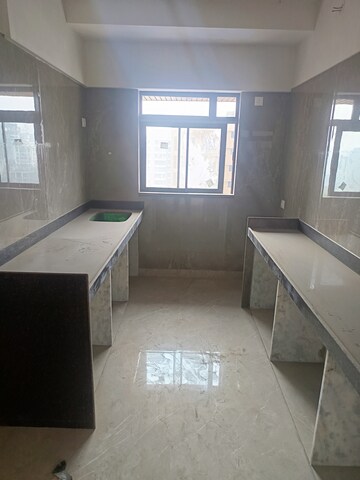 Kitchen in 3 BHK Apartment at Rangoli Goghari Mansion, Santacruz West – for Sale