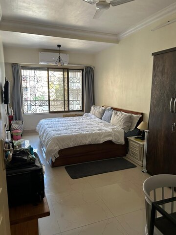 Bedroom in 2 BHK Apartment at Bombay Taximens CHS, Lbs Marg – for Rent