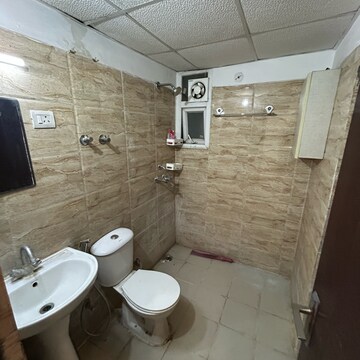 Bathroom in 3 BHK Apartment at Ajnara Le Garden, Panchsheel Green – for Sale