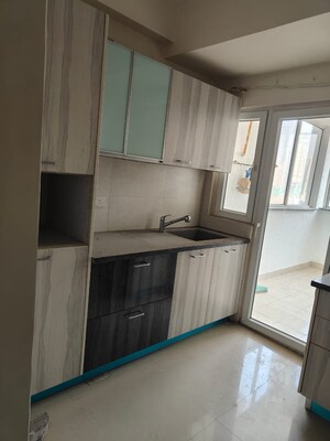 Kitchen in 3.5 BHK Apartment at Emaar The Enclave, Sector 66 – for Rent