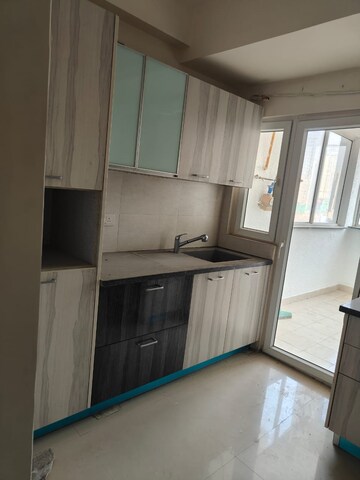 Kitchen in 3.5 BHK Apartment at Emaar The Enclave, Sector 66 – for Rent