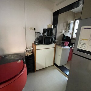 Team Area in 1 BHK Apartment at Pegasus Tower, Yari Road – for Rent