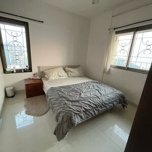 Bedroom in 1 BHK Apartment at Pegasus Tower, Yari Road – for Rent