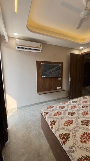 Bedroom in 4 BHK Builder Floor at Ansal Sushant Lok I, Sector 43 – for Rent